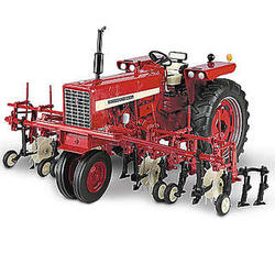 Farmall 544 Gas Narrow Front with Four-Row Cultivator Diecast
