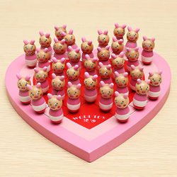 Wooden Piggies on Heart Shaped Board Solitaire Game