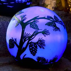 Glowing Outdoor Luminary Globe with Pine Cone Scene