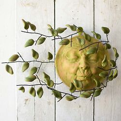 Sun Face with Blowing Leaves Wall Art