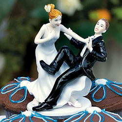 Comical Couple with the Groom Taking a Plunge Cake Topper