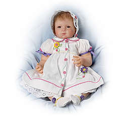 Dressed to Delight Baby Girl Doll