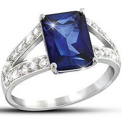 Blue Simulated Sapphire and Simulated Diamond Ring