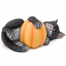Cat Playing with Lighted Pumpkin Figurine