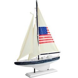 Sailboat Featuring an American Flag Sail